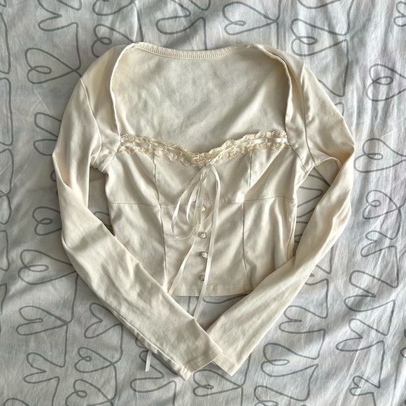 small cream/light yellow dainty long sleeve crop top from yesstyle - Picture 2 of 3